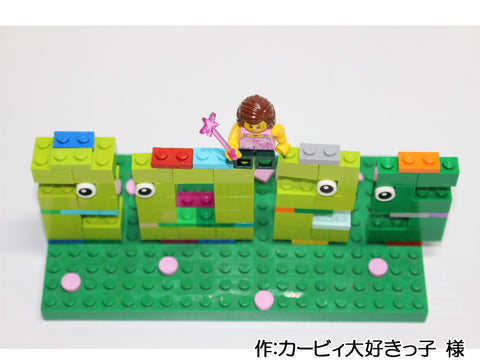 新年を平和な1年にするヘビと女の子(カービィ大好きっ子 様)