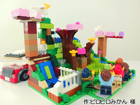 水の流れる公園でみんなでお花見(ピロピロみかん 様)