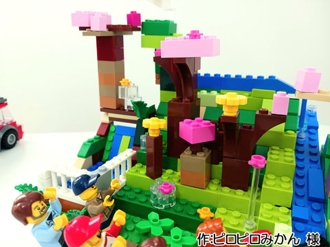 水の流れる公園でみんなでお花見(ピロピロみかん 様)