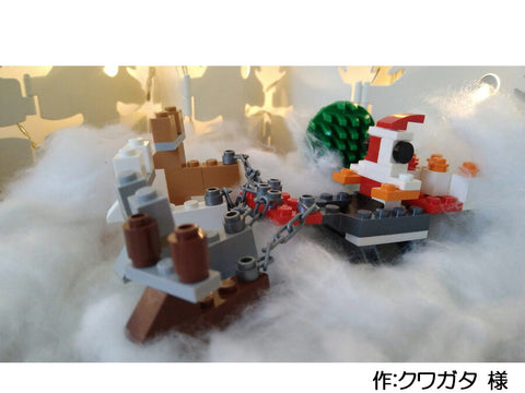 プレゼントを運ぶサンタ(クワガタ 様)