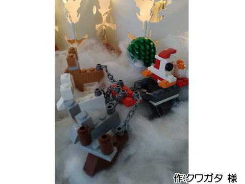 プレゼントを運ぶサンタ(クワガタ 様)