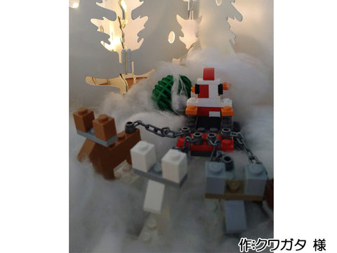 プレゼントを運ぶサンタ(クワガタ 様)